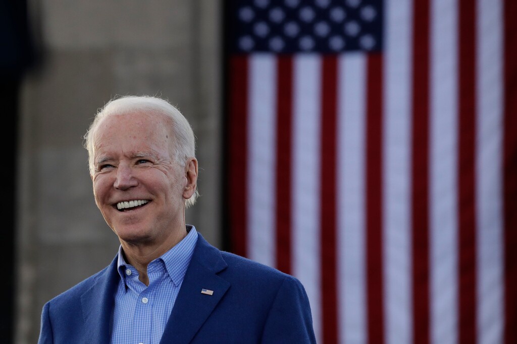 (Charlie Riedel | AP file photo) Democratic presidential candidate former Vice President Joe Biden acknowledges the crowd during a campaign rally in Kansas City, Mo., March 7, 2020.