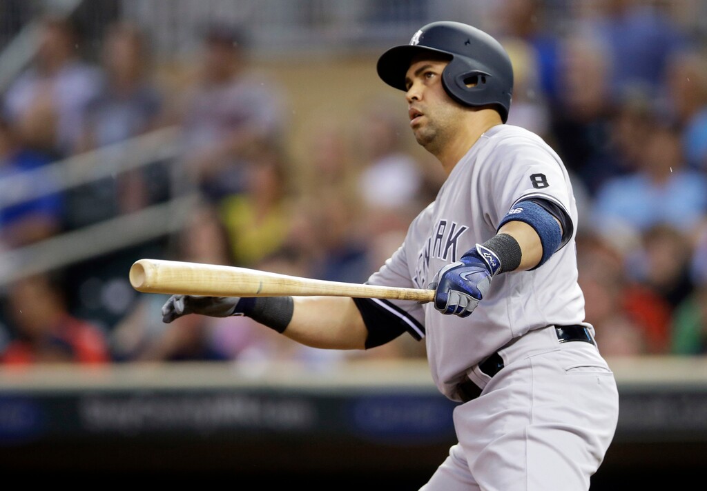 FILE - In this June 17, 2016, file photo, New York Yankees' Carlos Beltran watches his two-run home run off Minnesota Twins pitcher Pat Dean in the first inning of a baseball game in Minneapolis. Beltran has interviewed to become manager of the New York Yankees, four weeks after the final game of his 20-year major league career. (AP Photo/Jim Mone, File)