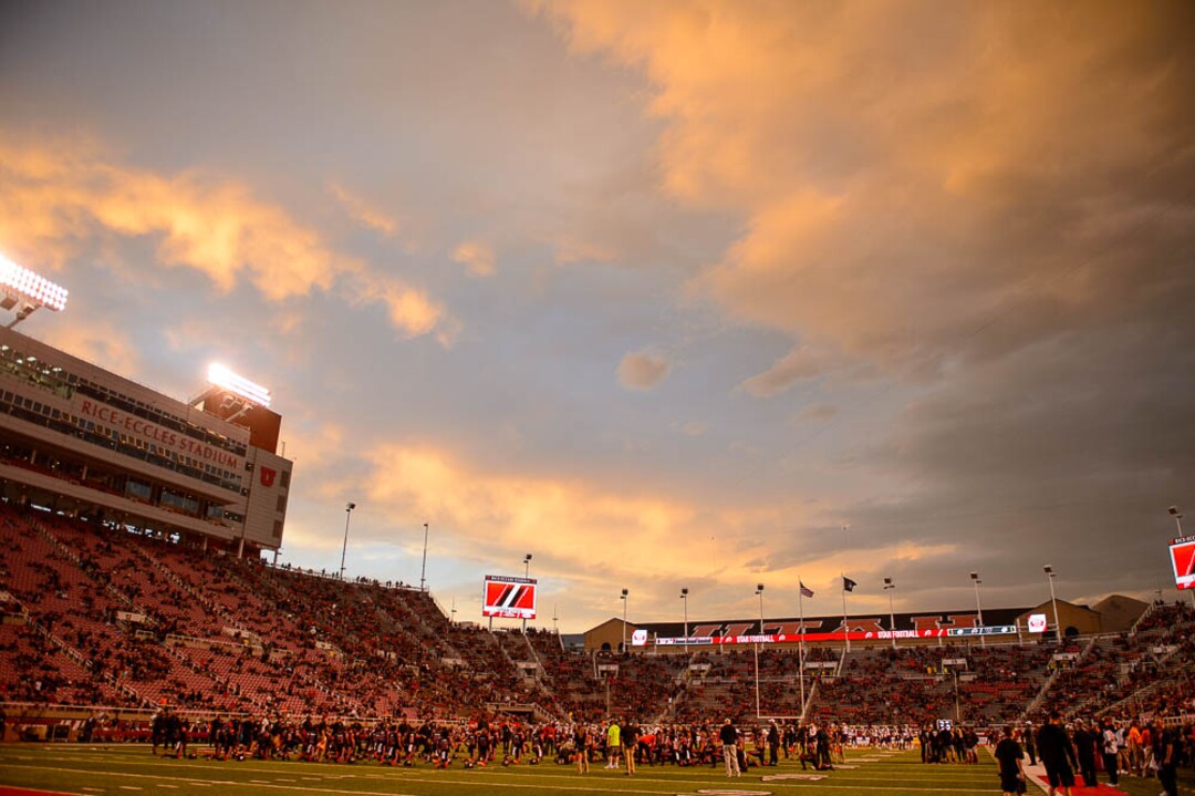 (Trent Nelson | The Salt Lake Tribune)  The sun sets as the University of Utah prepare to host Washington at Rice-Eccles Stadium in Salt Lake City, Saturday Sept. 15, 2018.