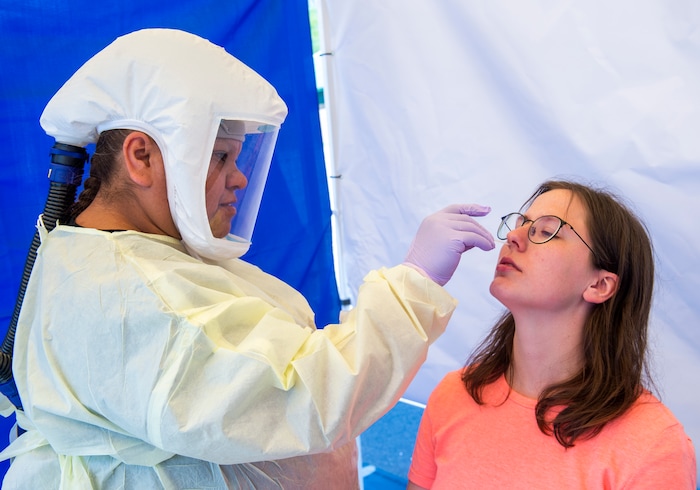 (Rick Egan  |  The Salt Lake Tribune)   Intermountain Healthcare medical assistant, Latoya Dovila, tests Kathy Jackson at the   Intermountain Healthcare Coronavirus Mobile Testing Unit at Utah Valley Hospital in Provo, Friday May 8, 2020