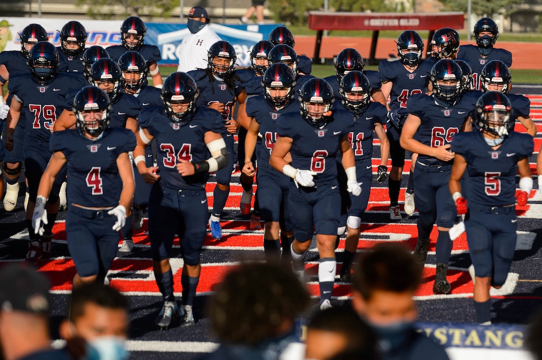 (Trent Nelson  |  The Salt Lake Tribune) Herriman players prepare to face Davis in a high school football game in Herriman on Thursday, Aug. 13, 2020.