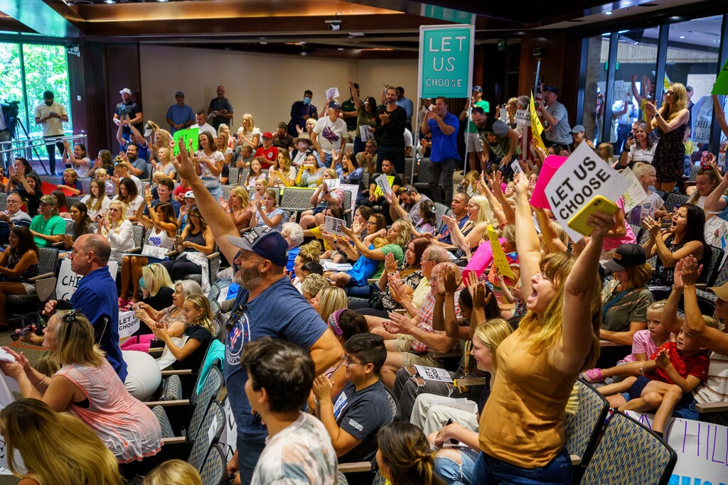 (Trent Nelson  |  The Salt Lake Tribune) People fill the room as the Salt Lake County Council voted down Dr. Angela Dunn's mask mandate for K-6 students, on Thursday, Aug. 12, 2021.
