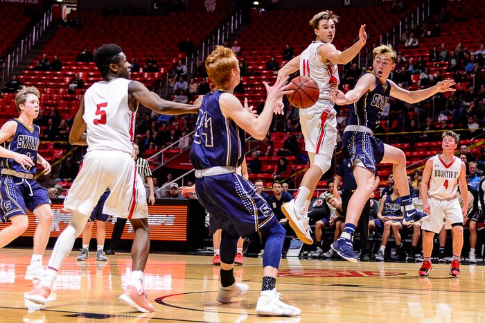 (Trent Nelson | The Salt Lake Tribune)  Skyline vs. Bountiful, 5A State high school basketball tournament at the Huntsman Center in Salt Lake City, Wednesday Feb. 28, 2018. Skyline's Tommy McGrath (3) passes to Skyline's Andrew Clark (24).