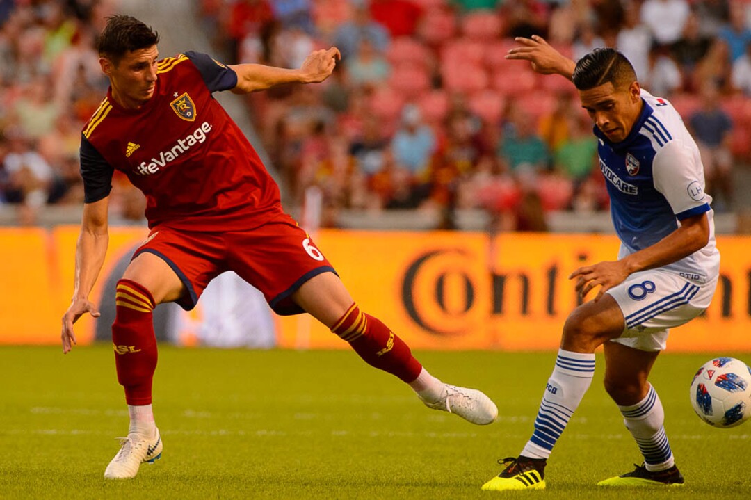 (Trent Nelson | The Salt Lake Tribune)  Real Salt Lake hosts FC Dallas, MLS soccer at Rio Tinto Stadium in Sandy, Saturday July 7, 2018. Real Salt Lake midfielder Damir Kreilach (6) and FC Dallas midfielder Victor Ulloa (8).