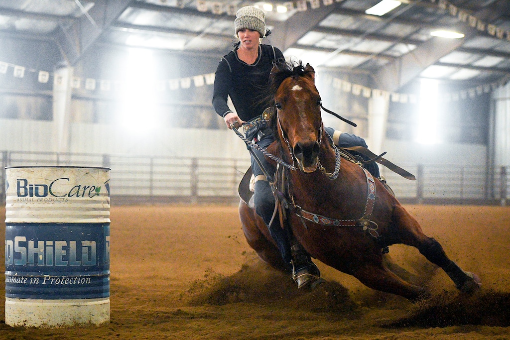 (Isaac Hale | The Daily Herald file photo) In this Jan. 7, 2017 file photo, Amberley Snyder rounds a barrel atop her horse named Legacy, also known as French Open, during the Dash for Cash barrel races at the Spanish Fork fairgrounds in Spanish Fork, Utah. Not everyone can say they've been a stunt double in a feature film. But that's exactly what Utah State University alumna Amberley Snyder, partially paralyzed professional barrel racer, is able to say now that she has finished filming "Walk Ride Rodeo," slated to debut on Netflix in 2019. The film will be a dramatic portrayal of Snyder's life with a full cast of actors and actresses.