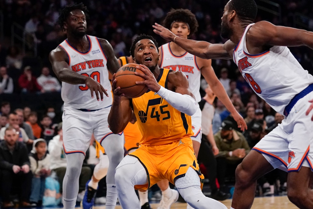Utah Jazz's Donovan Mitchell, center looks to shoot during the second half of an NBA basketball game against the New York Knicks, Sunday, March 20, 2022, in New York. (AP Photo/Seth Wenig)