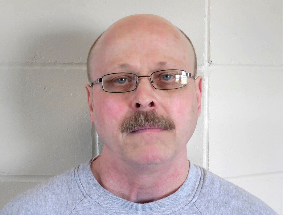 (Nebraska Department of Correctional Services via AP, File) This file photo provided by the Nebraska Department of Correctional Services shows death-row inmate Carey Dean Moore. Nebraska prison officials are preparing to execute Moore on Tuesday, Aug. 14, 2018, for the 1979 murders of two Omaha cab drivers. The execution comes three years after Nebraska lawmakers voted to abolish capital punishment, but did an about-face driven largely by the state's Republican governor.