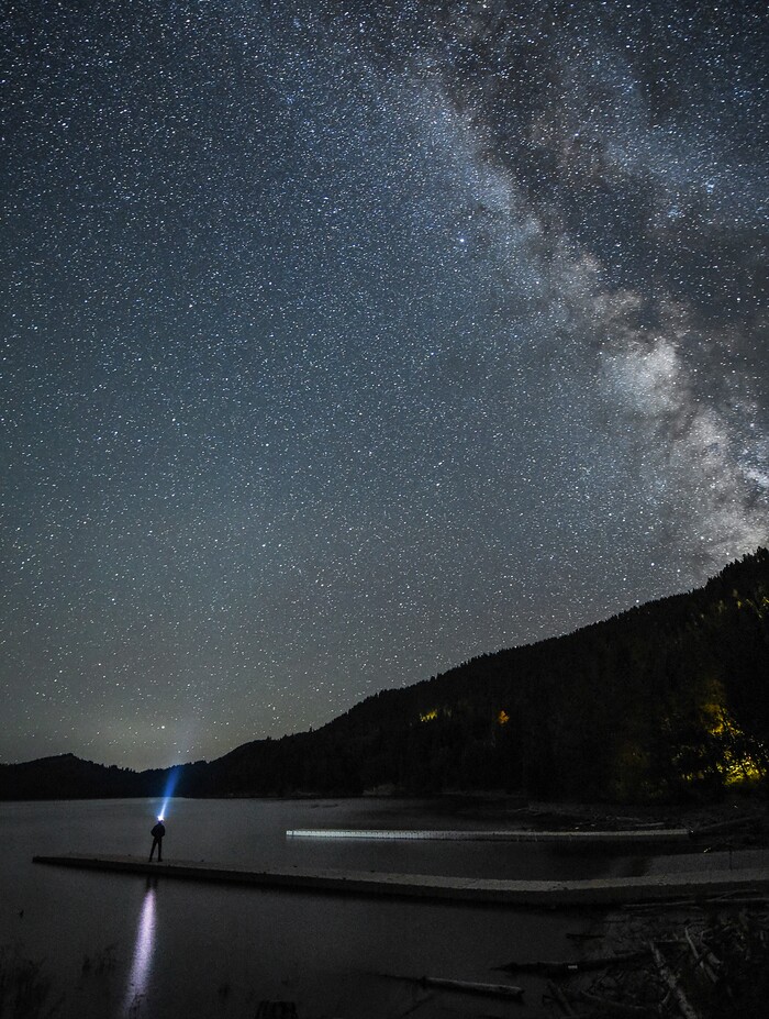 (Francisco Kjolseth  |  The Salt Lake Tribune)  Salt Lake City resident Brad Mager poses for a timed exposure of the Milky Way while camping out in the path of the August 21, 2017 eclipse at Palisades Reservoir, Idaho.