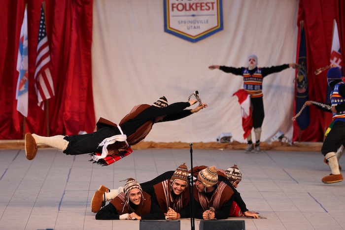 (Daniel Carde | for The Salt Lake Tribune) Performers from Peru dance at the World Folkfest at the Springville Arts Park, Springville, Thursday, Aug. 1, 2018.