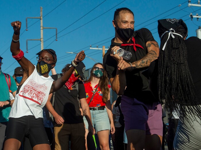 (Rick Egan  |  The Salt Lake Tribune)  Protesters  dance in downtown Salt Lake City, during the Dance Dance Revolution protest for racial equality, on Sunday, Aug. 9, 2020.