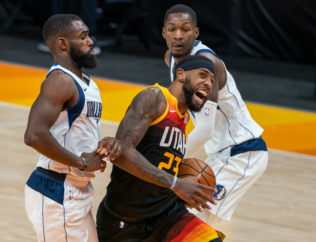 (Rick Egan | The Salt Lake Tribune) Utah Jazz forward Royce O'Neale (23) takes the ball to the hoop, as Dallas Mavericks forward Tim Hardaway Jr. (11) and Dallas Mavericks guard Josh Richardson (0) defend, in NBA action between the Utah Jazz and the Dallas Mavericks at Vivint Arena, on Friday, Jan. 29, 2021.
