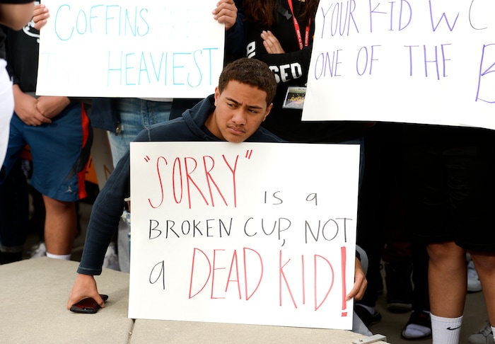 (Leah Hogsten  |  The Salt Lake Tribune) East High School student Sione Fineu left school to raise awareness and push for change with his classmates. Exactly one month after 17 people were killed at Marjory Stoneman Douglas High School in Parkland, survivors of the massacre joined tens of thousands of students across the United States by walking out of school,  Wednesday, March 14, 2018. 