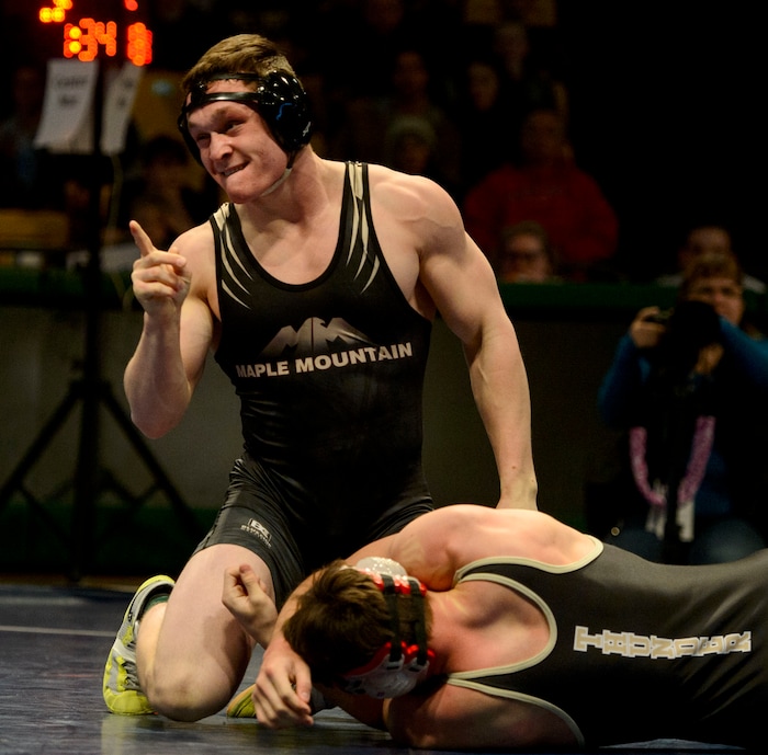 (Steve Griffin  |  The Salt Lake Tribune) Brandyn Van Tassell, of Maple Mountain, points his finger to his coaches after defeating Byron Anderson, of Desert Hills, during the All-Star Duals wrestling at Utah Valley University's UCCU Center in Orem Tuesday January 9, 2018.