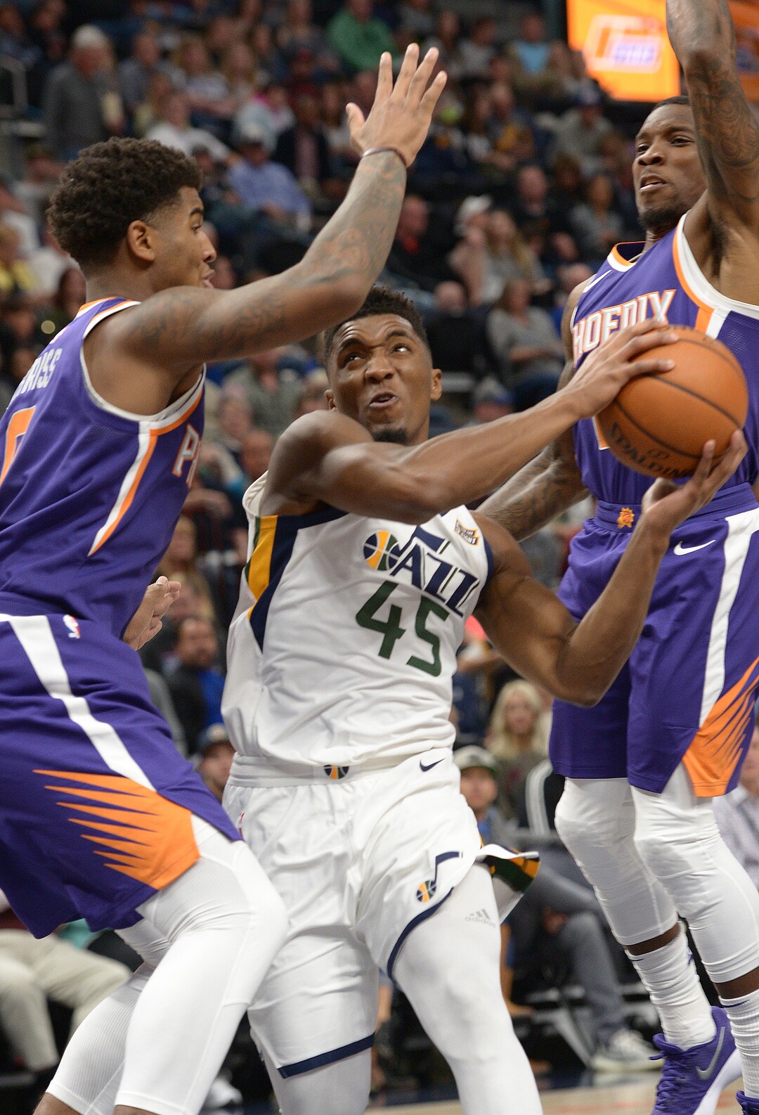 (Leah Hogsten  |  The Salt Lake Tribune) Utah Jazz guard Donovan Mitchell (45) battles Phoenix as the Utah Jazz host the Phoenix Suns during preseason NBA basketball at Vivint Smart Home Arena in Salt Lake City, October 6, 2017.