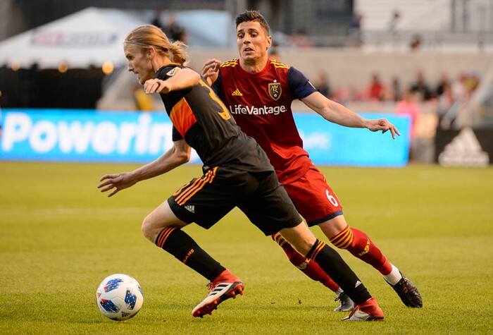(Trent Nelson | The Salt Lake Tribune)  
Houston's Jared Watts (33) and Real Salt Lake midfielder Damir Kreilach (6) as Real Salt Lake hosts Houston Dynamo, MLS Soccer at Rio Tinto Stadium in Sandy, Utah, Wednesday May 30, 2018.