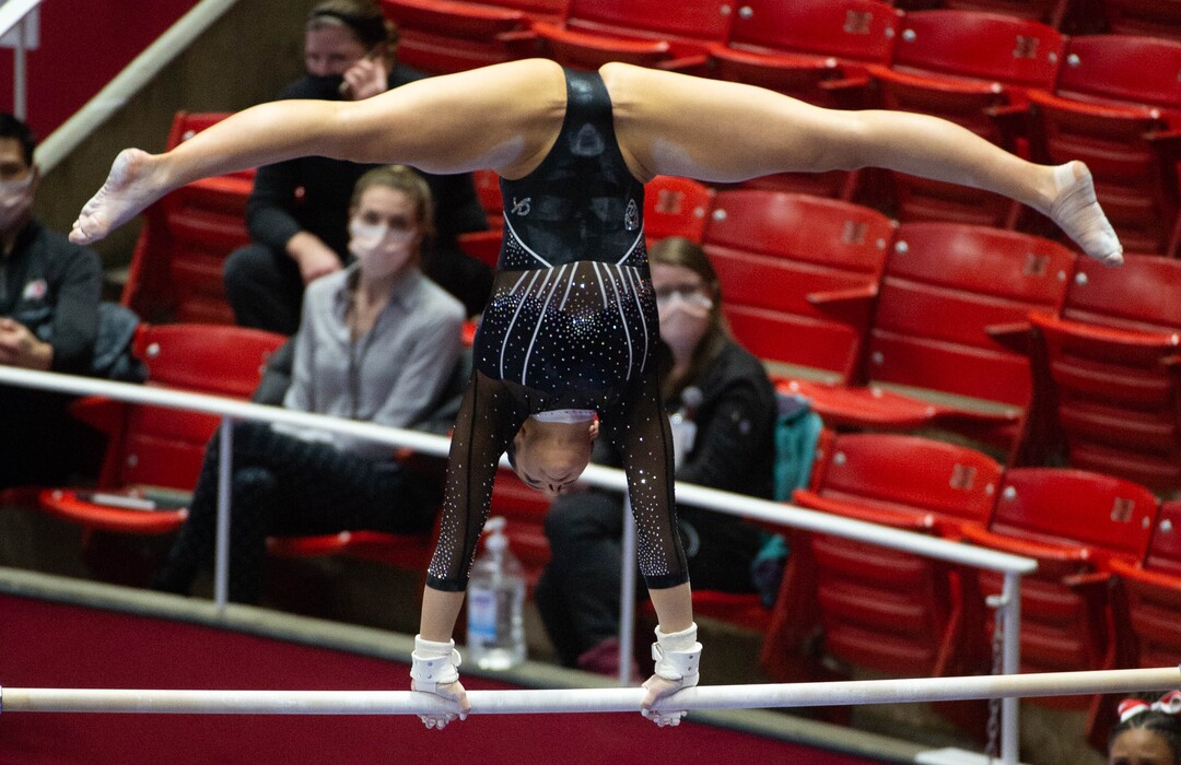 (Francisco Kjolseth  | The Salt Lake Tribune) Alexia Burch competes on the uneven bars in PAC-12 gymnastics action Utah vs UCLA, at the Huntsman Center on Friday, Feb. 19, 2021.