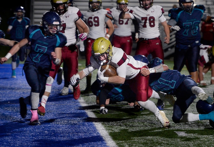(Scott Sommerdorf   |  The Salt Lake Tribune)   Juab's Alex White scores on this play to cut Juan Diego's lead to 20-12 during first half play. Juan Diego beat Juab 33-28, Friday, October 6, 2017. 
