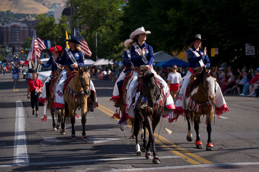 (Bethany Baker  |  The Salt Lake Tribune) The Great American Stampede Rodeo Royalty wave to the crowd during the Days of Õ47 Parade in Salt Lake City on Friday, July 24, 2026.