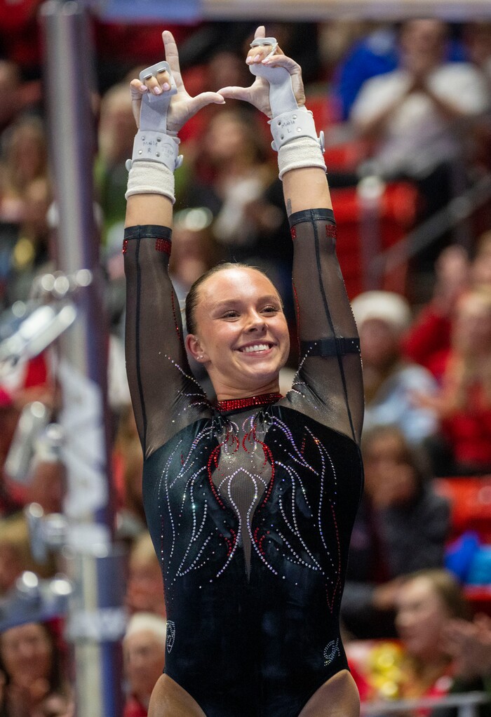 (Rick Egan | The Salt Lake Tribune)  Marie O'Keefe performs on the bars, in gymnastics action between Utah Red Rocks and Oregon State, at the Jon M. Huntsman Center, on Friday, Feb. 2, 2024.