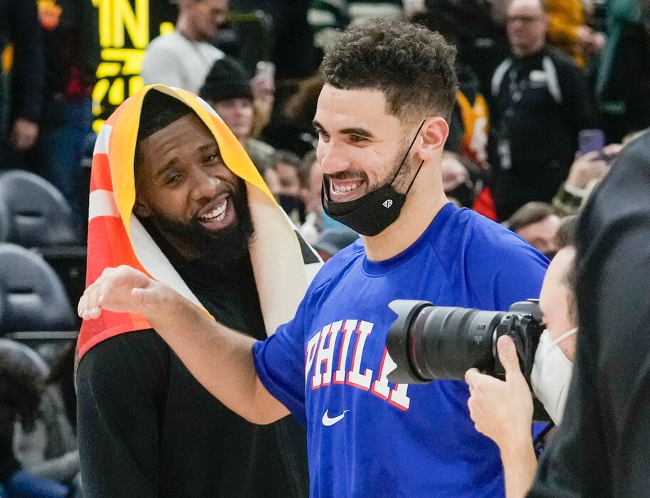 (Leah Hogsten | The Salt Lake Tribune)  Utah Jazz forward Royce O'Neale (23) shares a laugh with former Jazz player Philadelphia 76ers forward Georges Niang (20) after the game. The Jazz defeated the 76ers 120-85, Nov. 16, 2021 at Viviant Arena. 