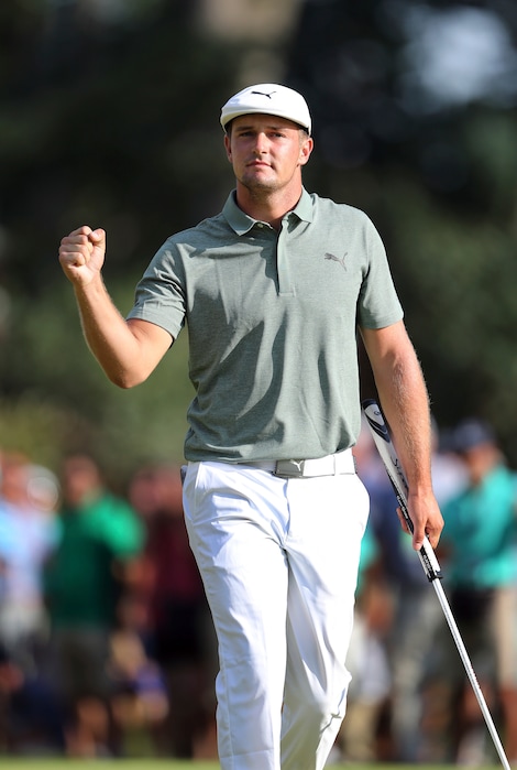 Bryson DeChambeau celebrates a birdie putt on the 18th hole during the third round of the Northern Trust golf tournament, Saturday, Aug. 25, 2018, in Paramus, N.J. (AP Photo/Mel Evans)