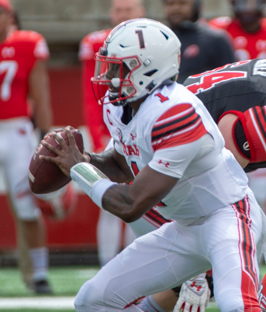 (Rick Egan  |  The Salt Lake Tribune)  Quarterback Tyler Huntley runs with the ball, in Utah's spring Red-White game at Rice-Eccles Stadium, Saturday, April 13, 2019.