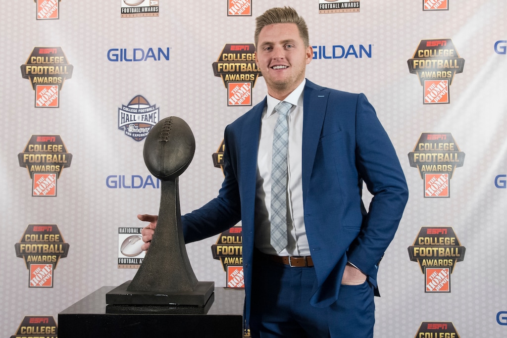 Utah's Matt Gay winner of the Lou Groza Collegiate Place-Kicker Award for most outstanding kicker stands with the trophy during the College Football Awards show at the College Football Hall of Fame, Thursday, Dec. 7, 2017, in Atlanta. (AP Photo/John Amis)