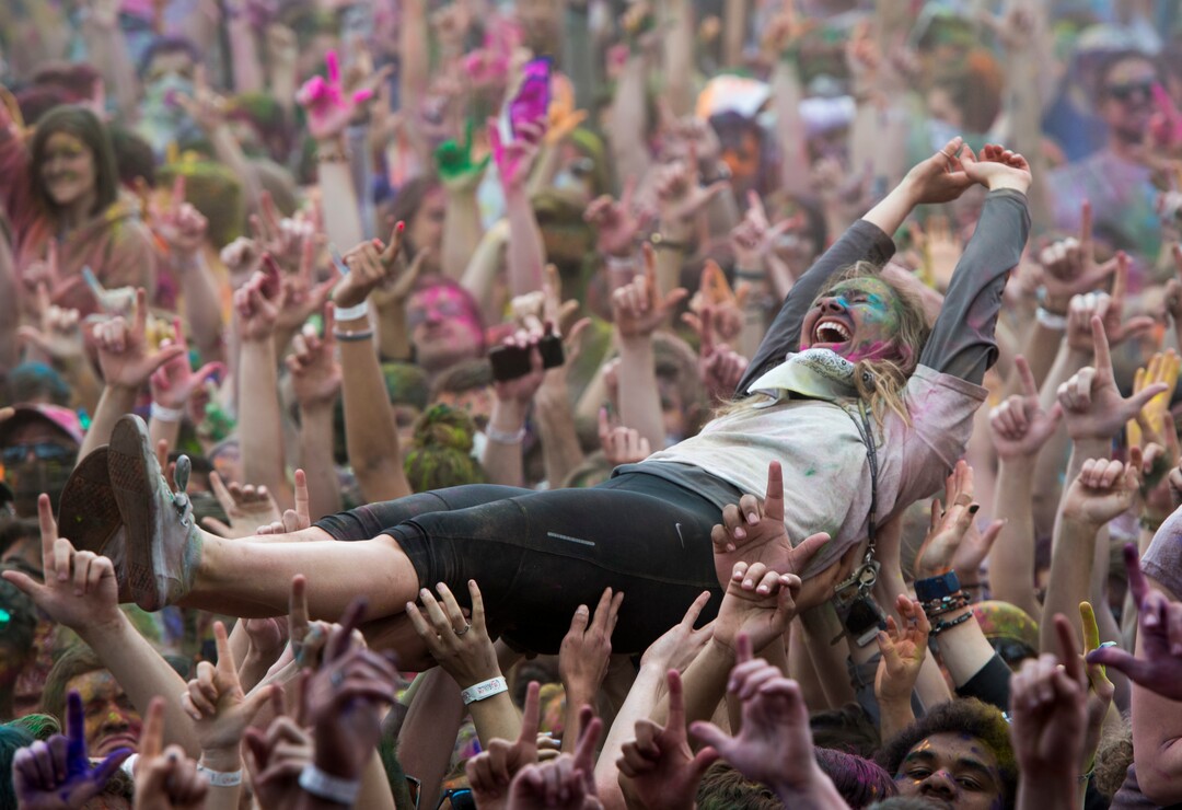 (Rick Egan  |  The Salt Lake Tribune)     Revelers crowd surf, during the 22nd annual Holi Festival of Colors at the Sri Sri Radha Krishna Temple in Spanish Fork, Saturday, March 24, 2018. The festival which celebrates the beginning or spring is also known as at the Festival of Love.