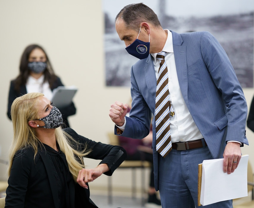 (Trent Nelson | The Salt Lake Tribune) Paris Hilton bumps elbows with Sen. Michael McKell, R-Spanish Fork, after a vote on SB-127 to the Senate Judiciary, Law Enforcement, and Criminal Justice Standing Committee in Salt Lake City on Monday, Feb. 8, 2021.
