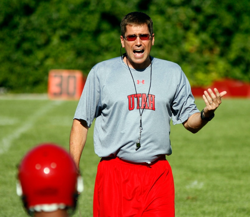 (Rick Egan | Tribune file photo) In this 2008 file photo, offensive coordinator Andy Ludwig talks to the quarterbacks during the Utes first practice of that year. It was confirmed on Jan. 11, 2019, that Ludwig will return to the same position at the University of Utah.