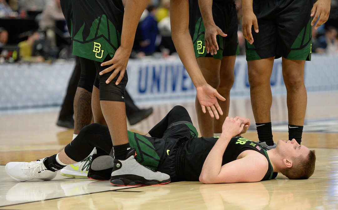 (Francisco Kjolseth  |  The Salt Lake Tribune)  Baylor Bears guard Makai Mason (10) takes a moment to get back up as Syracuse faces Baylor in their first round menÕs NCAA March Madness tournament game at Vivint Smart Home Arena in Salt Lake City on Thursday, March 21, 2019.