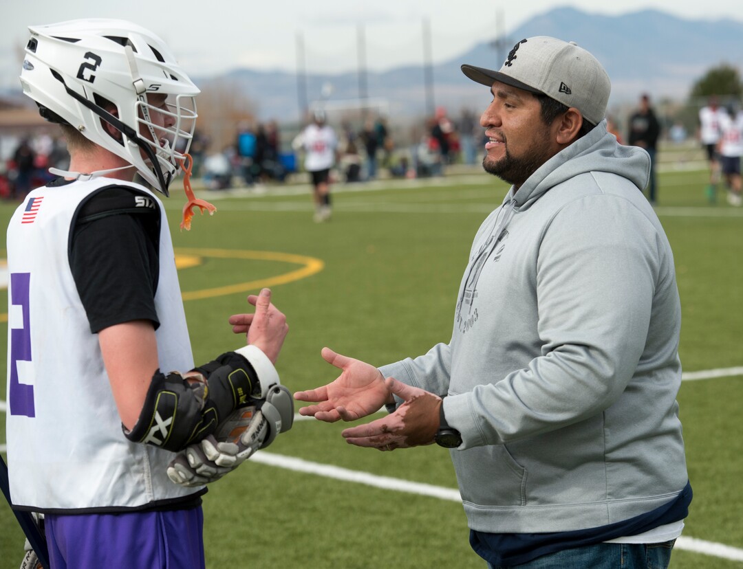 (Rick Egan | The Salt Lake Tribune) Player Cru Andreasen talks to Box Elder lacrosse coach Juan Gaytan during a tournament in Logan on Saturday, Nov. 3, 2018.