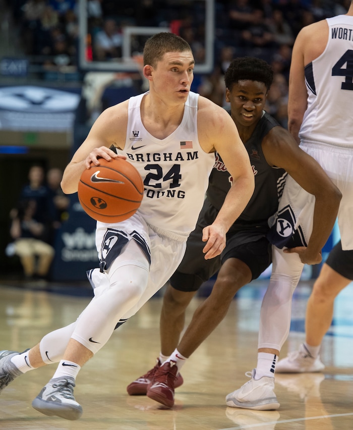 (Rick Egan  |  The Salt Lake Tribune)       Brigham Young Cougars guard McKay Cannon (24) takes the ball down court, in basketball action between Brigham Young Cougars and Santa Clara Broncos at the Marriott Center in Provo, Saturday, Jan. 12, 2019.



