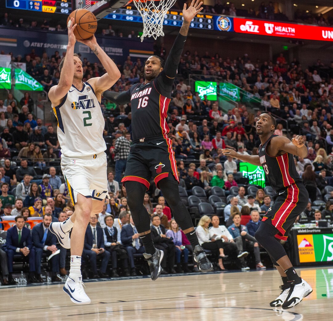 (Rick Egan  |  The Salt Lake Tribune)     Utah Jazz forward Joe Ingles (2) looks to pass, as Miami Heat forward James Johnson (16) defends, in NBA action between Utah Jazz and Miami Heat, at Viint Smart Home Arena Wednesday, Dec. 12, 2018.