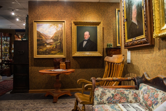 (Rachel Molenda  |  The Salt Lake Tribune)  A painting by George Beard, left, and a portrait of Heber C. Kimball hang at Anthony's Fine Art in Salt Lake City, on Thursday, July 19, 2018, as part of a display of early pioneer art and furniture on display.