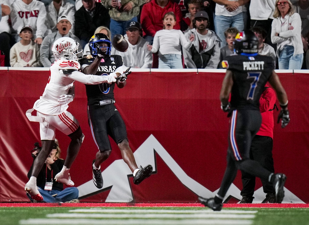(Bethany Baker  |  The Salt Lake Tribune) Utah Utes cornerback James Chenault Jr. (5) interferes as Kansas Jayhawks wide receiver Nahzae Cox (0) reaches for at the ball during the game between the Utah Utes and the Kansas Jayhawks at Rice-Eccles Stadium in Salt Lake City on Saturday, Oct. 10, 2026.