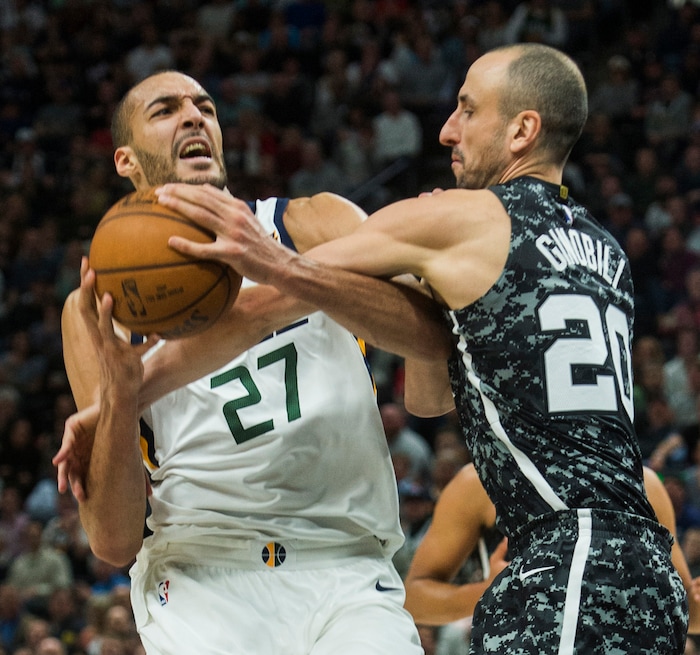 (Rick Egan  |  The Salt Lake Tribune)  San Antonio Spurs guard Manu Ginobili (20) stops a fast break by fouling Utah Jazz center Rudy Gobert (27), in NBA action, in Salt Lake City, Monday, February 12, 2018.