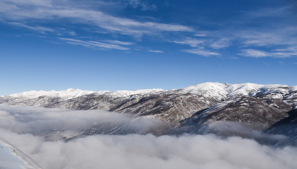 (Francisco Kjolseth | Tribune file photo) The Wasatch Range is illuminated above Bountiful as the air quality continues to deteriorate under inversion conditions on Monday, Jan. 14, 2019, obscuring the ground below as pilot Jeff Greenland takes every opportunity to fly above the poor conditions. Over the radio with Salt Lake Approach before landing he can be heard saying "thanks for keeping us all safe during the shutdown," as the longest government shutdown in U.S. history drags on.