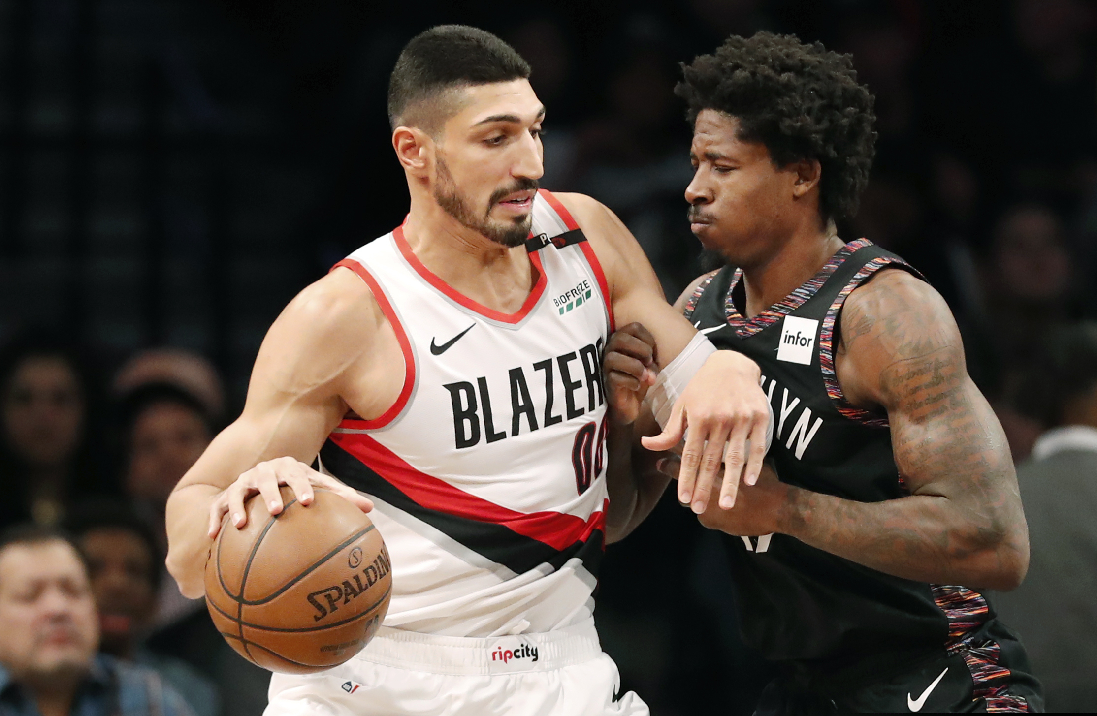 (AP Photo/Kathy Willens) Portland Trail Blazers center Enes Kanter (00) works against Brooklyn Nets forward Ed Davis (17) during the first half of an NBA basketball game Thursday, Feb. 21, 2019, in New York.