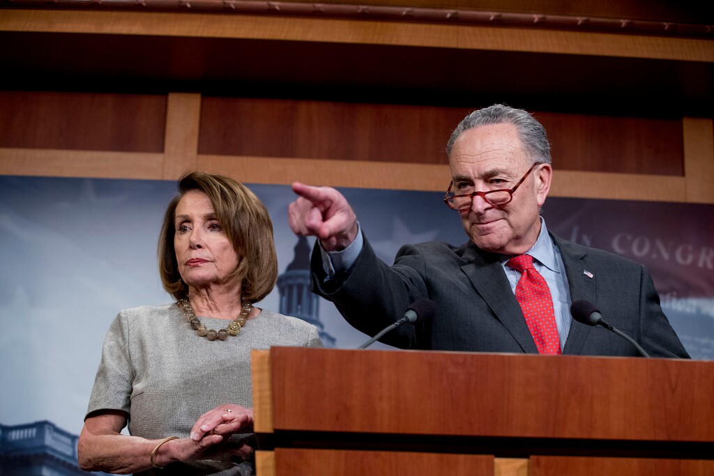 (Andrew Harnik | Associated Press file photo)  Senate Minority Leader Sen. Chuck Schumer of N.Y., accompanied by Speaker Nancy Pelosi of Calif., left, calls on a reporter during a news conference on Capitol Hill in Washington, Friday, Jan. 25, 2019.
