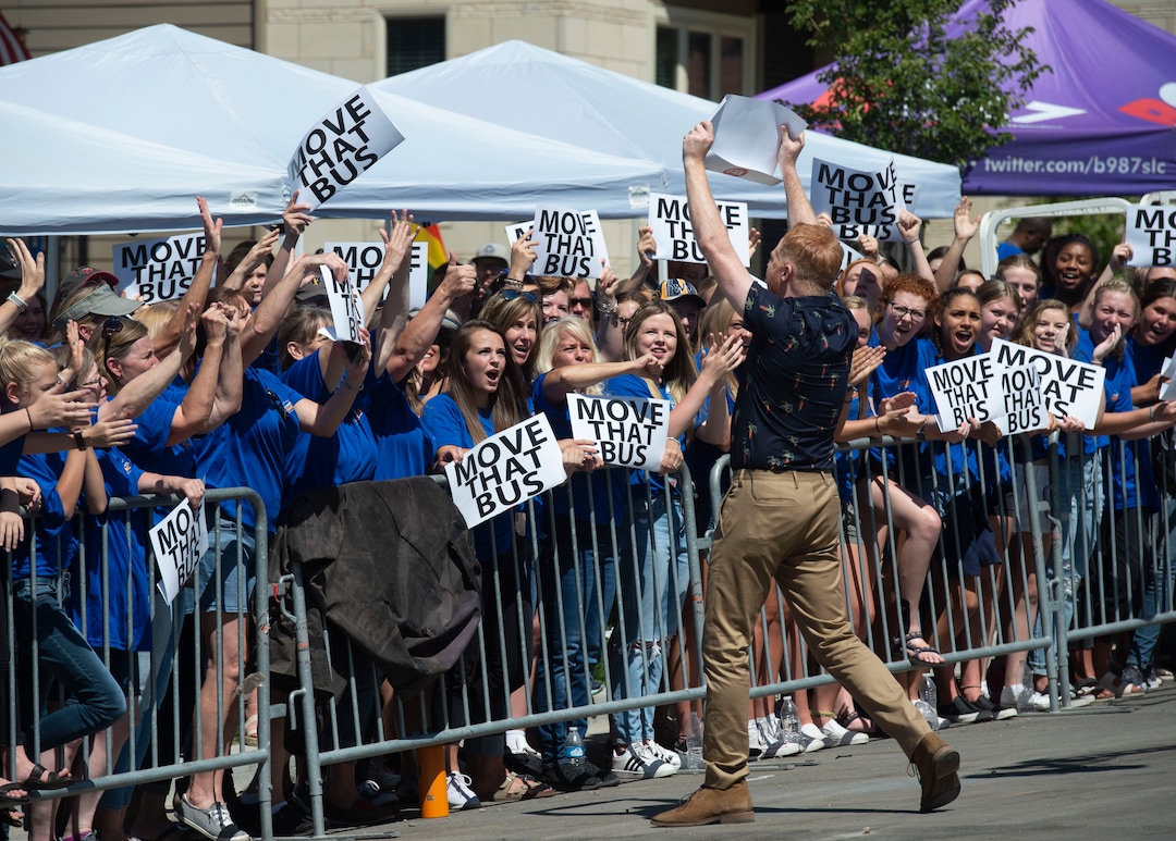 (Rick Egan | The Salt Lake Tribune) Jesse Tyler Ferguson gets the crowd going while filming an episode of the TV show "Extreme Makeover: Home Edition" in Ogden, Thursday, Aug. 15, 2019.