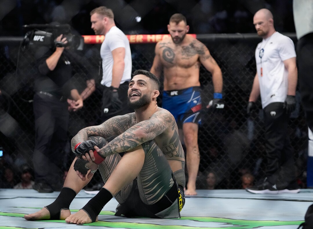 (Francisco Kjolseth | The Salt Lake Tribune) Tyson Pedro of Australia celebrates his quick win in the first round over Harry Hunsucker of the United States in UFC 278 during their mixed martial arts bout in the octagon in Salt Lake City on Saturday, Aug. 20, 2022.  
