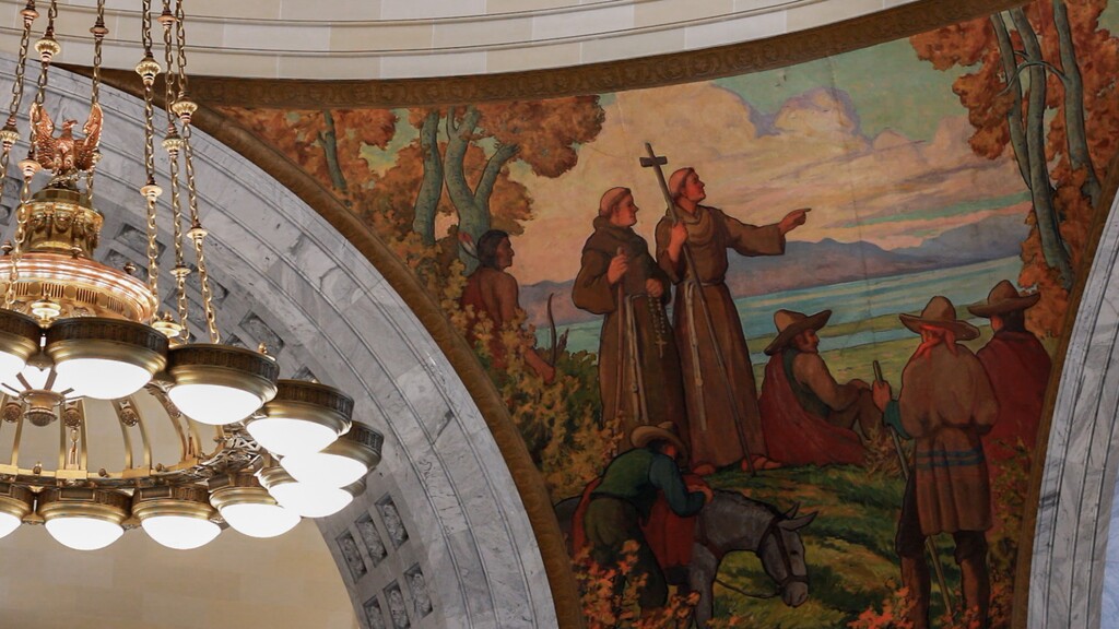 (Abigail Landwehr | The Salt Lake Tribune) A depiction of The Domínguez–Escalante Expedition, featuring two Spanish friars, Atanasio Domínguez and Silvestre Vélez de Escalante, is displayed on the ceiling of the Utah Capitol on Thursday, June 25, 2026.