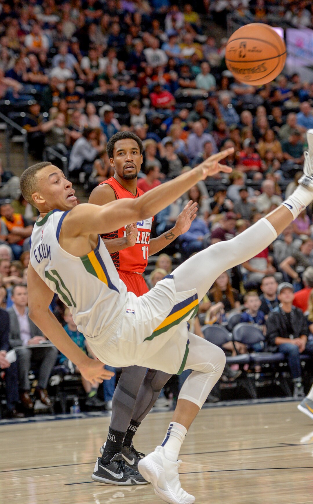 Leah Hogsten  |  The Salt Lake Tribune   Utah Jazz guard Dante Exum (11) fight to control the ball as the Utah Jazz host the Perth Wildcats, Sept. 29, 2018 at Vivint Smart Home Arena.