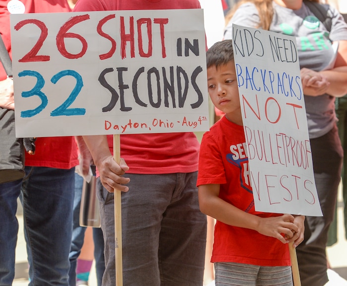 (Leah Hogsten  |  The Salt Lake Tribune) Members of Moms Demand Action for Gun Sense in America gathered at Washington Square Park to demand change in gun laws in reaction to the August mass shootings in Dayton, Ohio and El Paso, Texas, and the hundreds of Americans who are wounded and killed by gun violence every day.