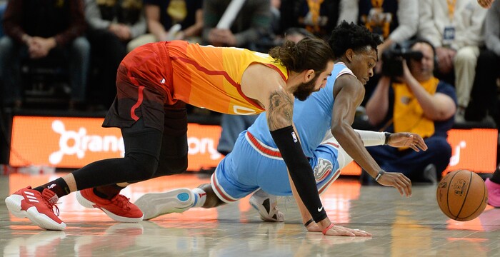 (Francisco Kjolseth  |  The Salt Lake Tribune)  Utah Jazz guard Ricky Rubio (3) battles for a ball with Sacramento Kings guard De'Aaron Fox (5) in the NBA game at Vivint Smart Home Arena Wed., Nov. 21, 2018, in Salt Lake City.