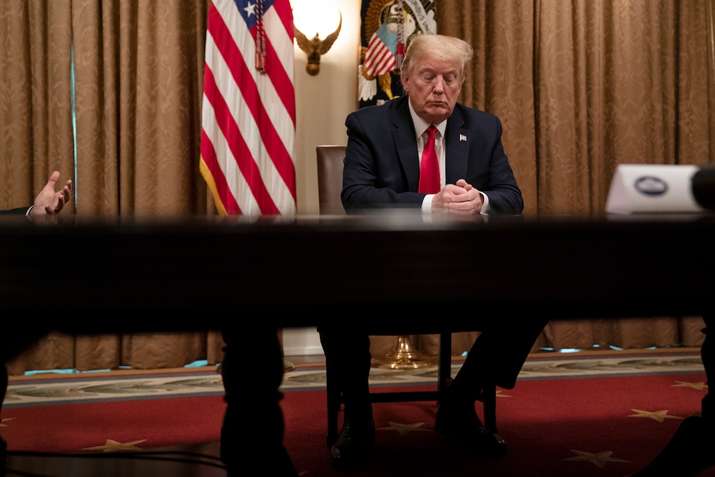 (Evan Vucci | AP) President Donald Trump listens during a meeting with business leaders on coronavirus testing, in the Cabinet Room of the White House, Monday, April 27, 2020, in Washington.