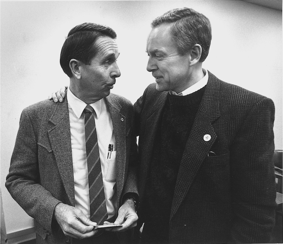(The Salt Lake Tribune) Sen. Orrin Hatch, right, talks to U.S. Forest Service chief Stan Tixier about trying to get the Snowbasin landswap reversed during a meeting in Ogden with various civic leaders, March 13, 1990.