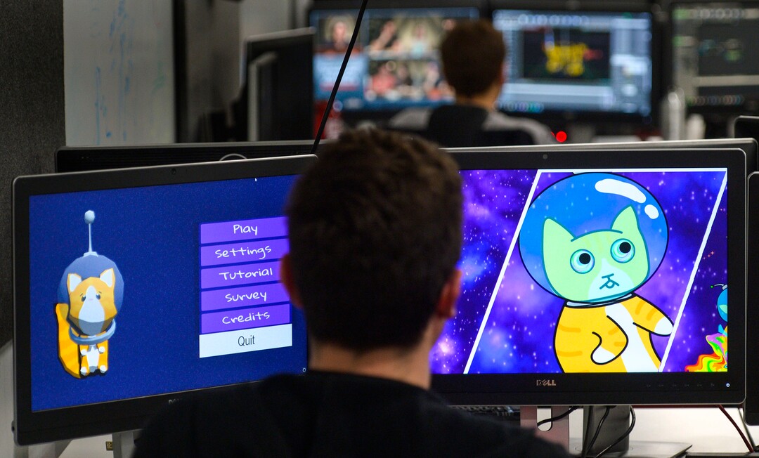 (Steve Griffin  |  The Salt Lake Tribune) Robert Bare, a student in the University of Utah's Entertainment Arts & Engineering department (EAE), runs through the demonstration of his game Zoom Zoom Newton during the department's  two-day event celebrating its 10th anniversary at the University of Utah in Salt Lake City Monday April 30, 2018. Tuesday is EAE Launch Day, where  students show off their game designs and finished games.