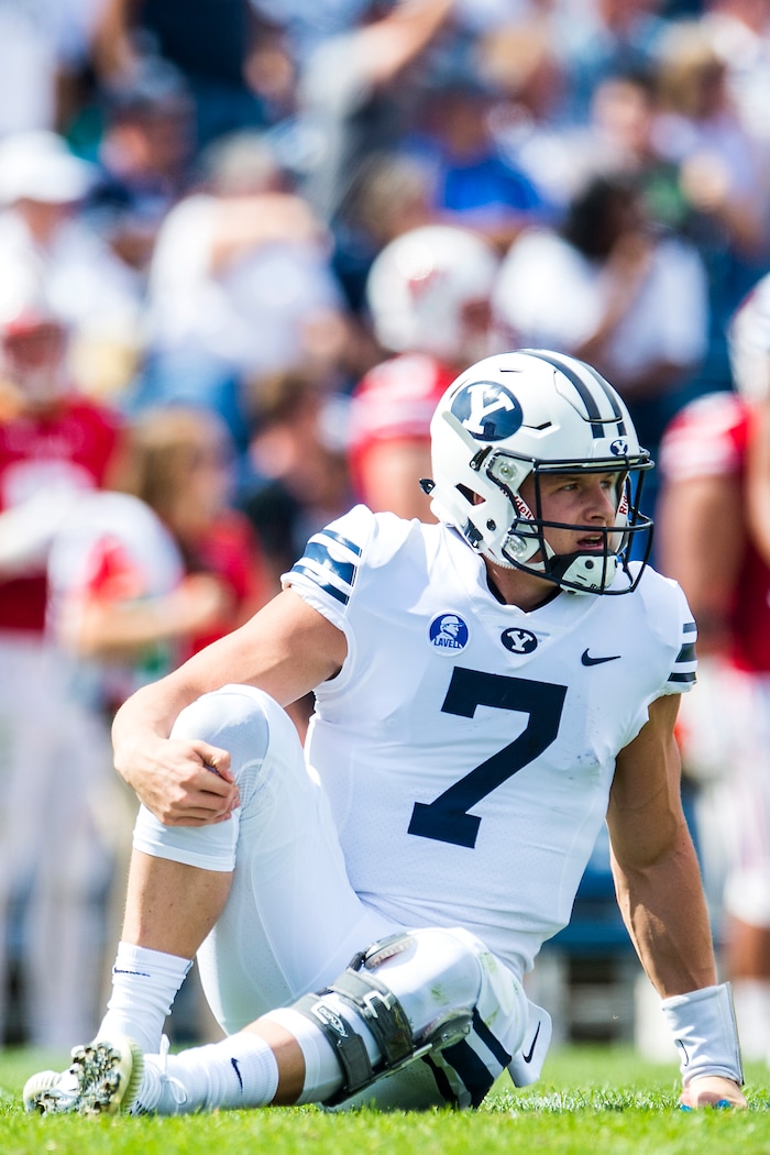 (Chris Detrick  |  The Salt Lake Tribune)   Brigham Young Cougars quarterback Beau Hoge (7) remains on the ground during the game at LaVell Edwards Stadium Saturday Saturday, September 16, 2017. Wisconsin Badgers are leading Brigham Young Cougars 24-6 at halftime.